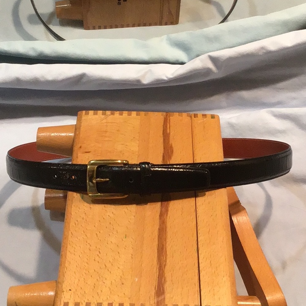 Alligator/leather belt by the M.J.H. Company